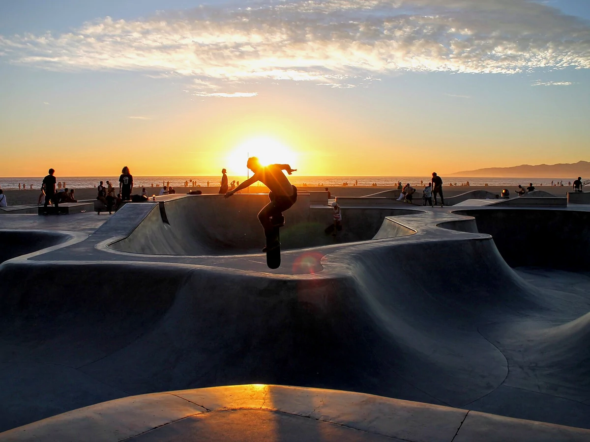 Skateboarder riding a bowl at Venice Beach skatepark